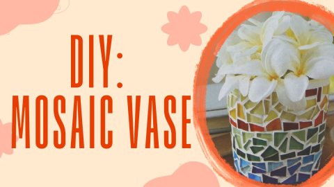 Mosaic vase of flowers with orange background